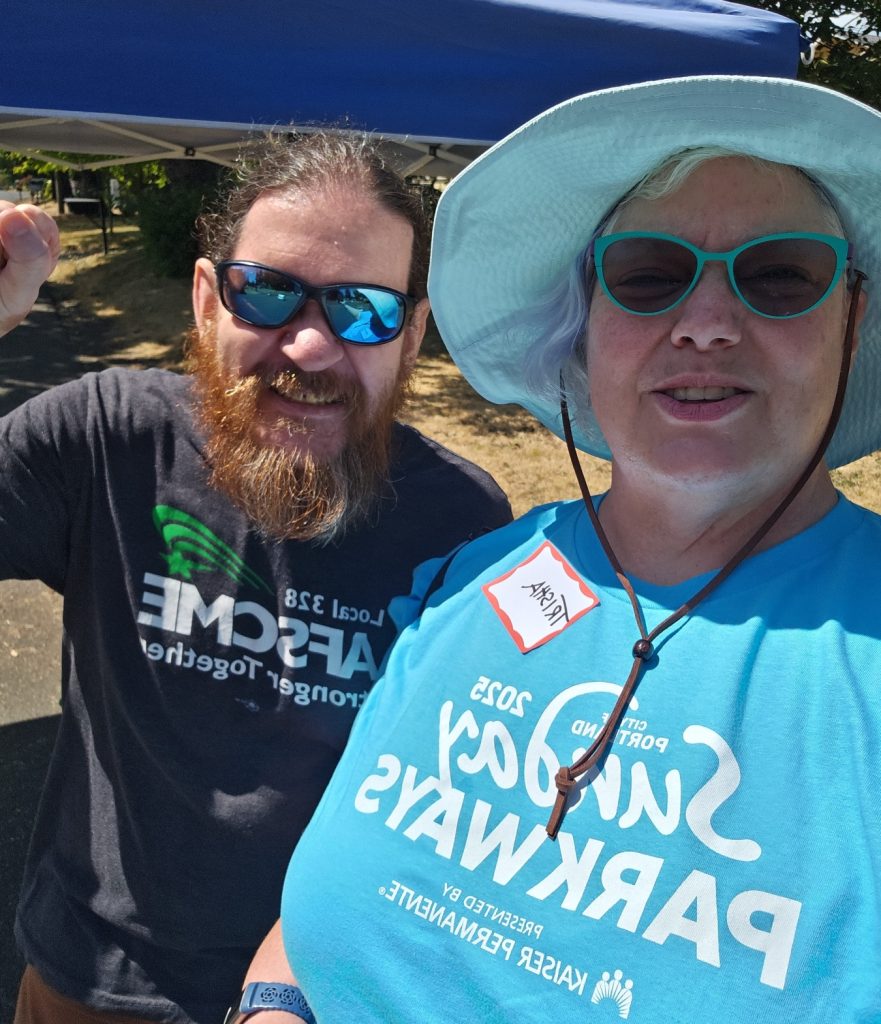 Trisha Crabb, a white woman, at Sunday Parkways representing 328 with fellow 328 member